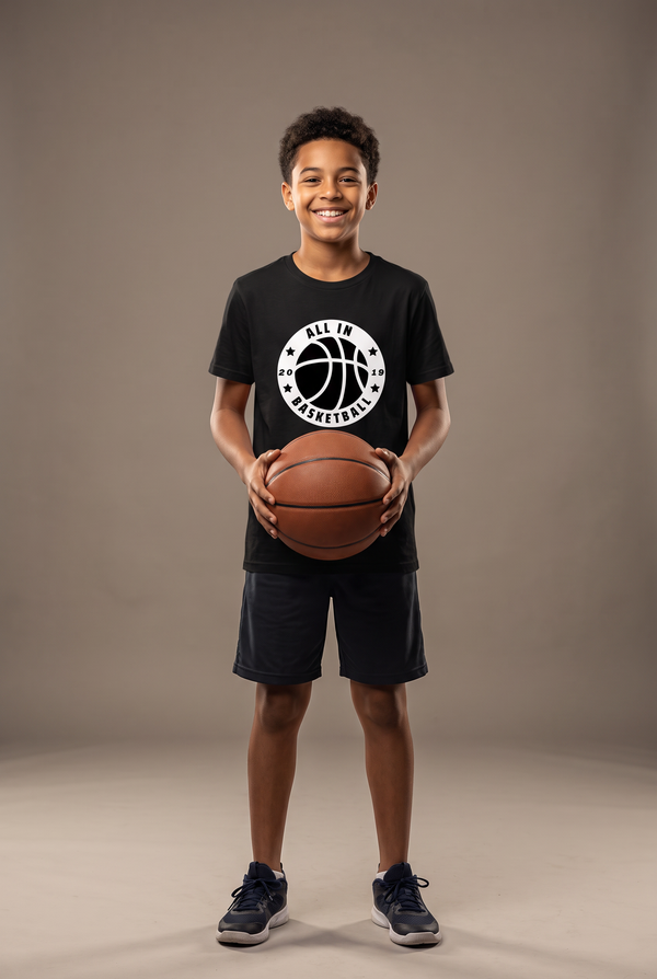 All In badge youth tee — editorial, worn by young athlete