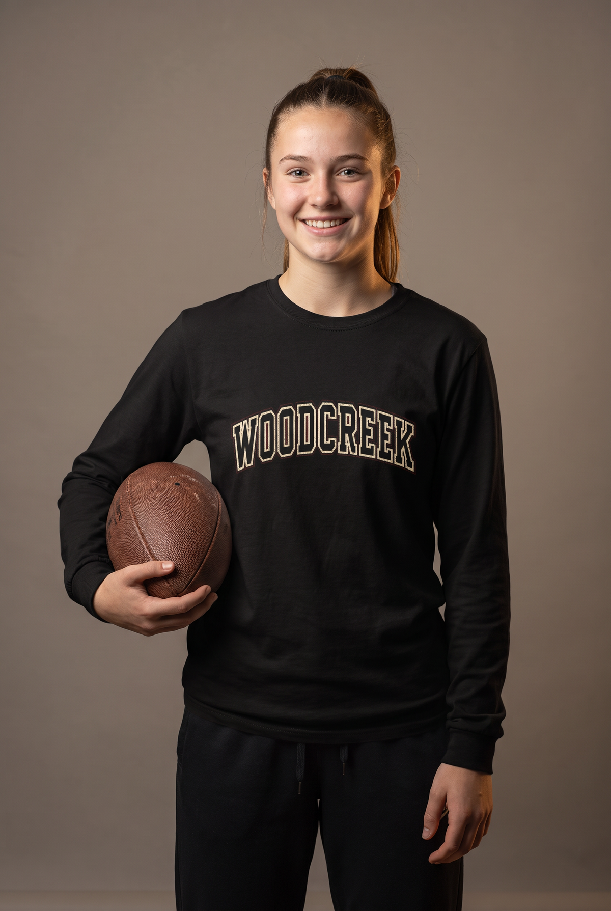 Woodcreek Flag Football college letter long sleeve — editorial, worn by athlete