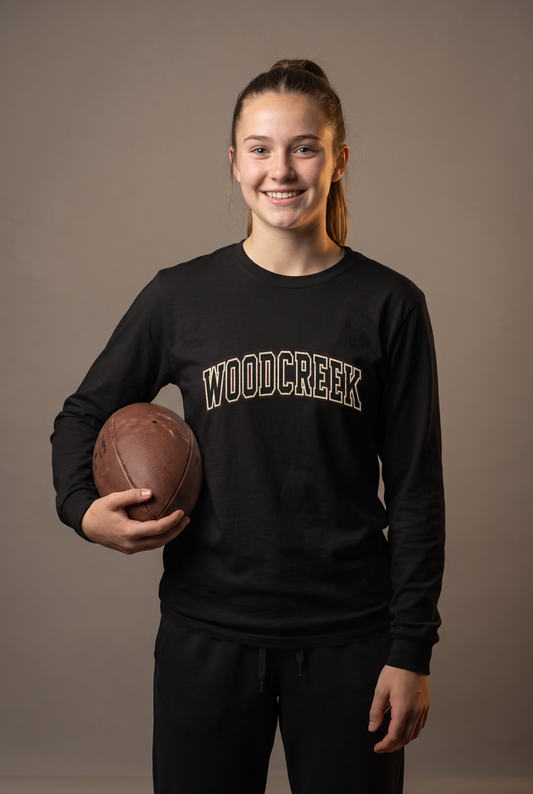 Woodcreek Flag Football college letter long sleeve — editorial, worn by athlete