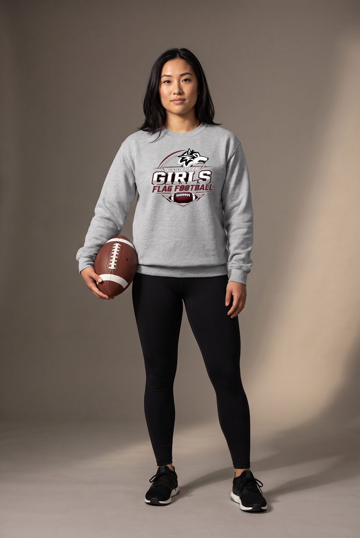 Woodcreek Flag Football gameday crewneck — editorial, worn by athlete