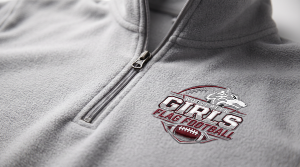 Woodcreek Flag Football quarter zip — collar and logo detail