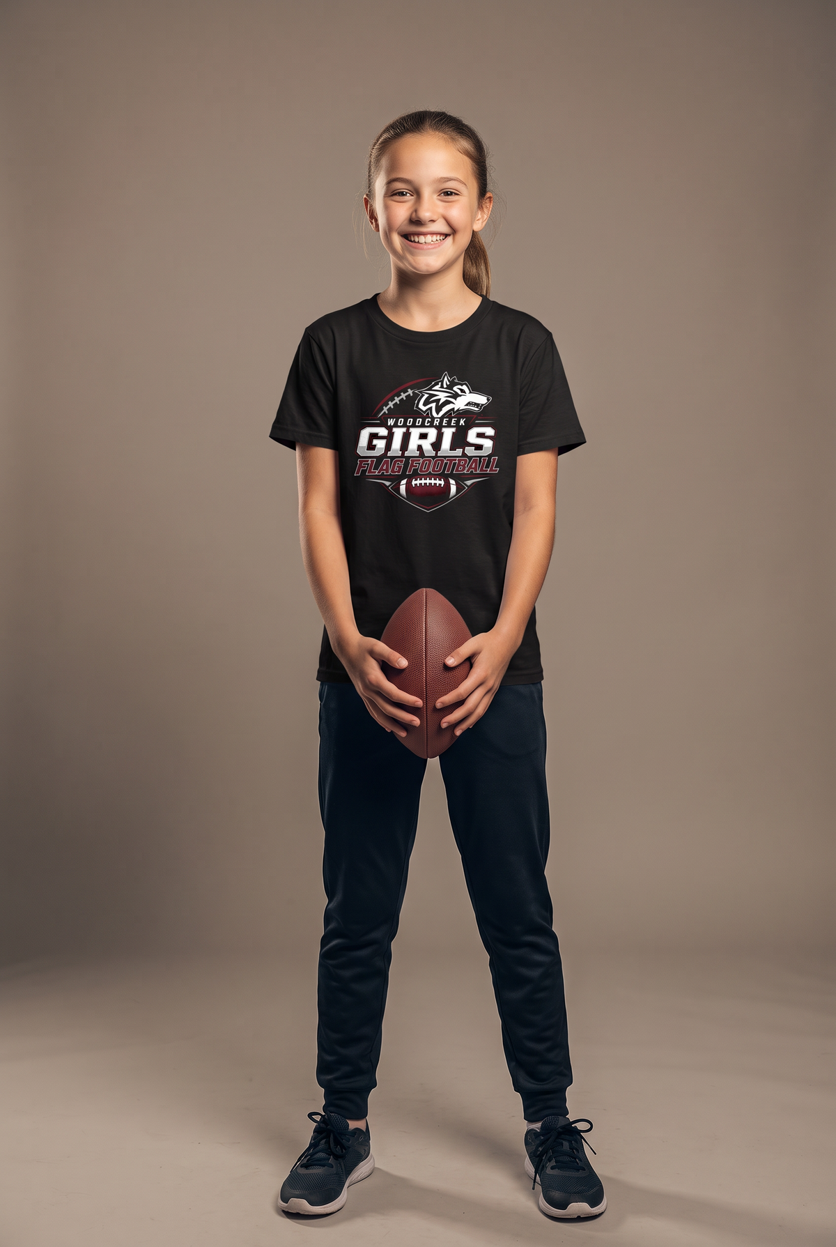 Woodcreek Flag Football youth tee — editorial, worn by young athlete