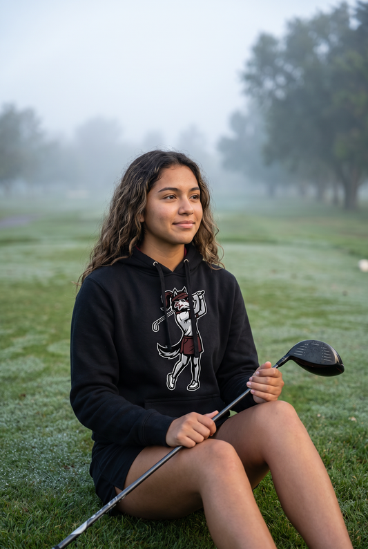 Woodcreek Girls Golf Swing Wolf Fleece Hoodie in Black with the girls Swing Wolf mascot across the chest, worn on a foggy tee box