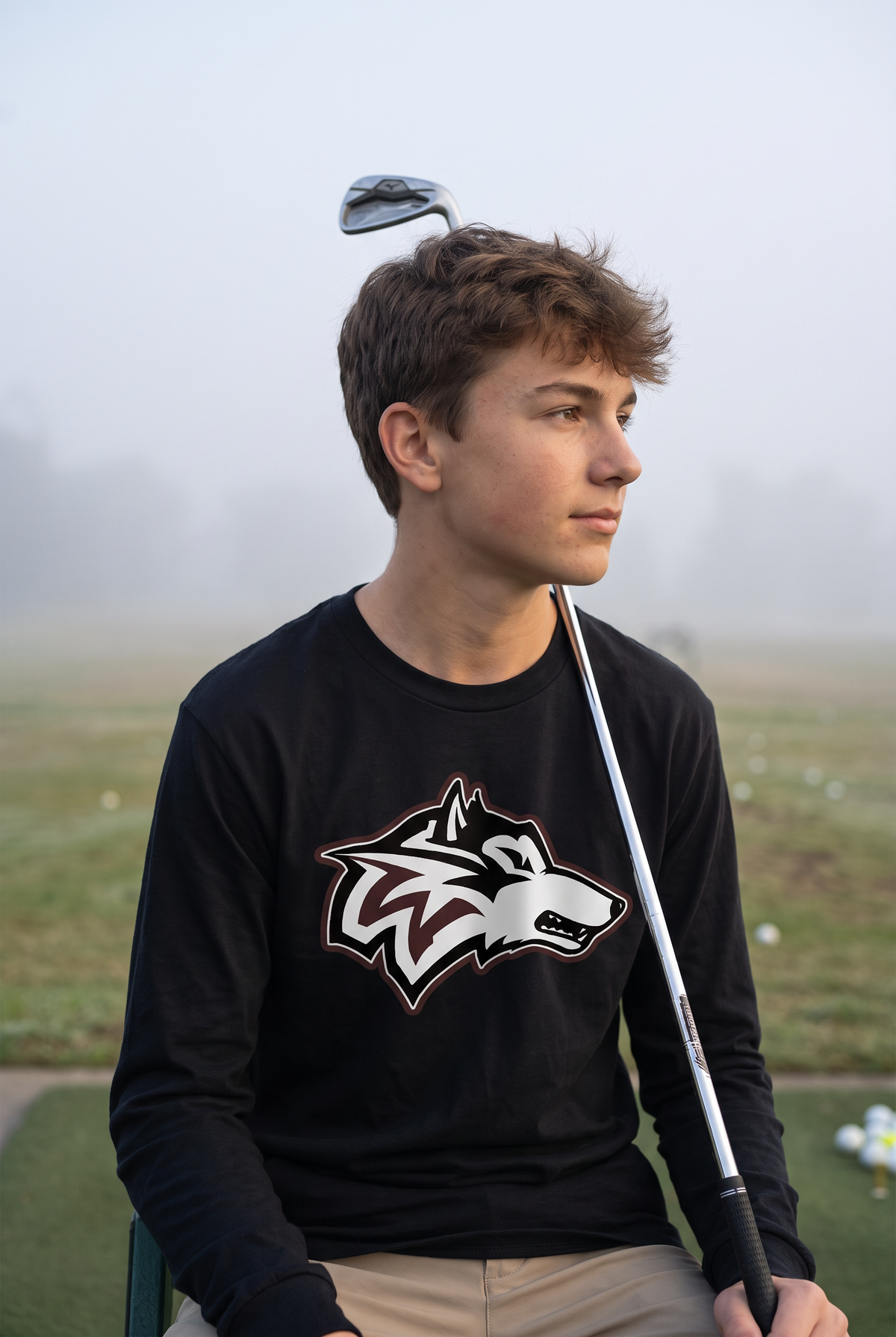 Woodcreek Boys Golf Long Sleeve Tee in Black, second view in morning fog