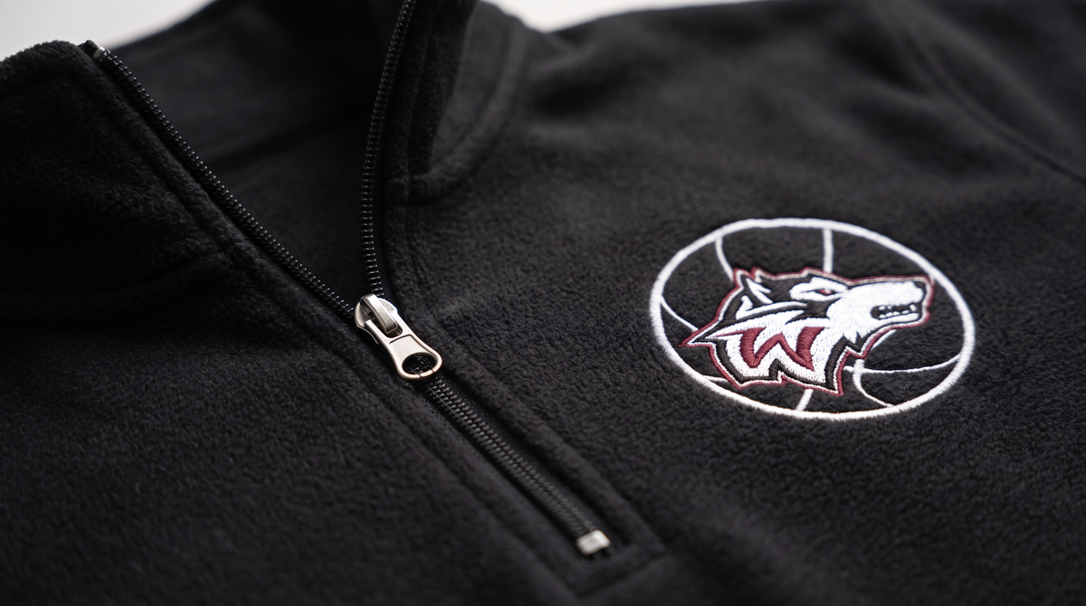 Woodcreek Wolfball quarter zip — collar and logo detail