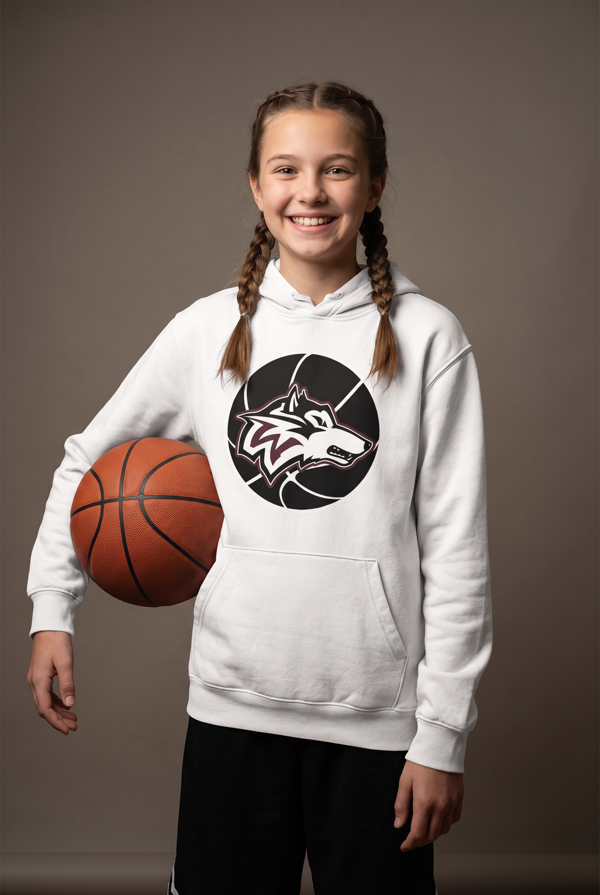 Woodcreek Wolfball youth hoodie — editorial, worn by young athlete